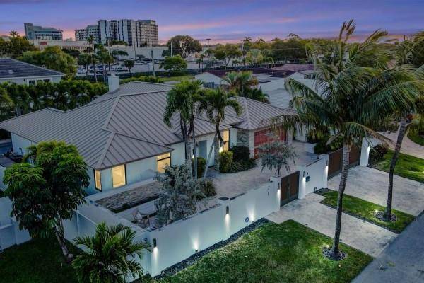Stunning modern home in prestigious Coral Ridge Country Club !