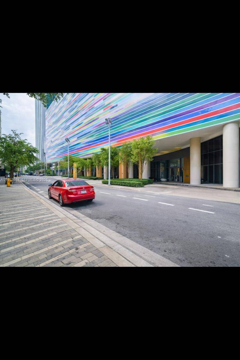 Turnkey 1BD den with sliding door, ideal for home office or additional sleeping area.