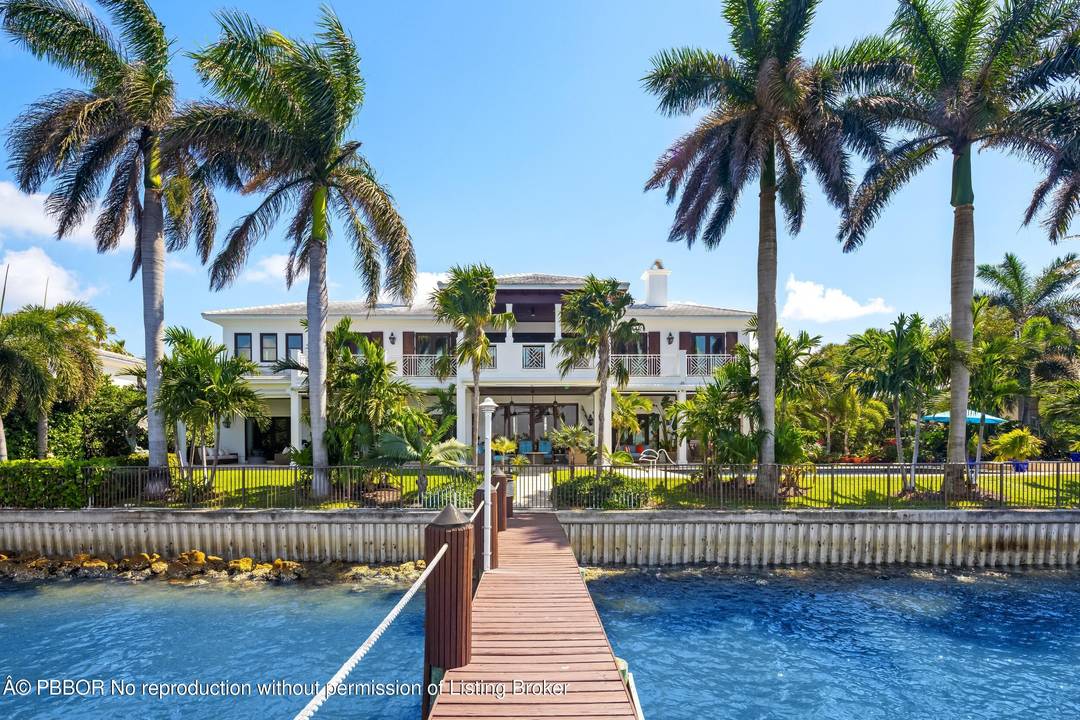 Stunning British Colonial estate in serene Point Manalapan.