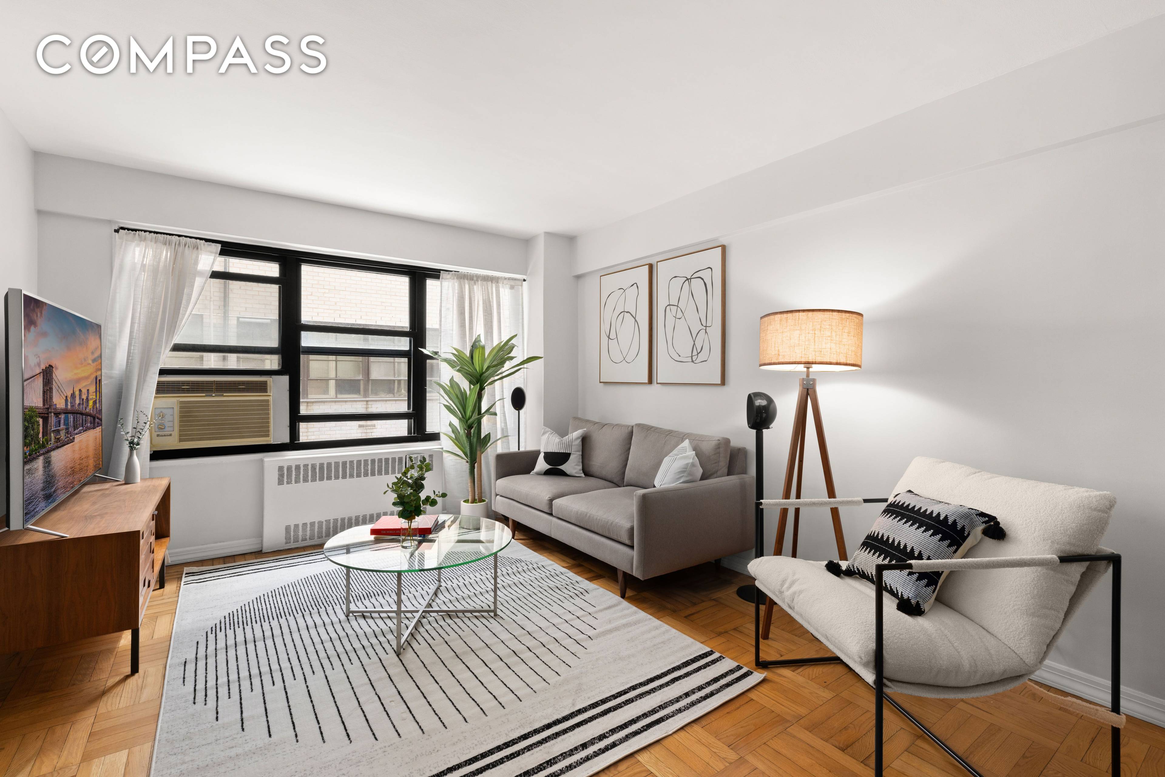 This south facing gem in Midtown East CONVERTED 2 Bedroom offers the perfect blend of space, function, and style.