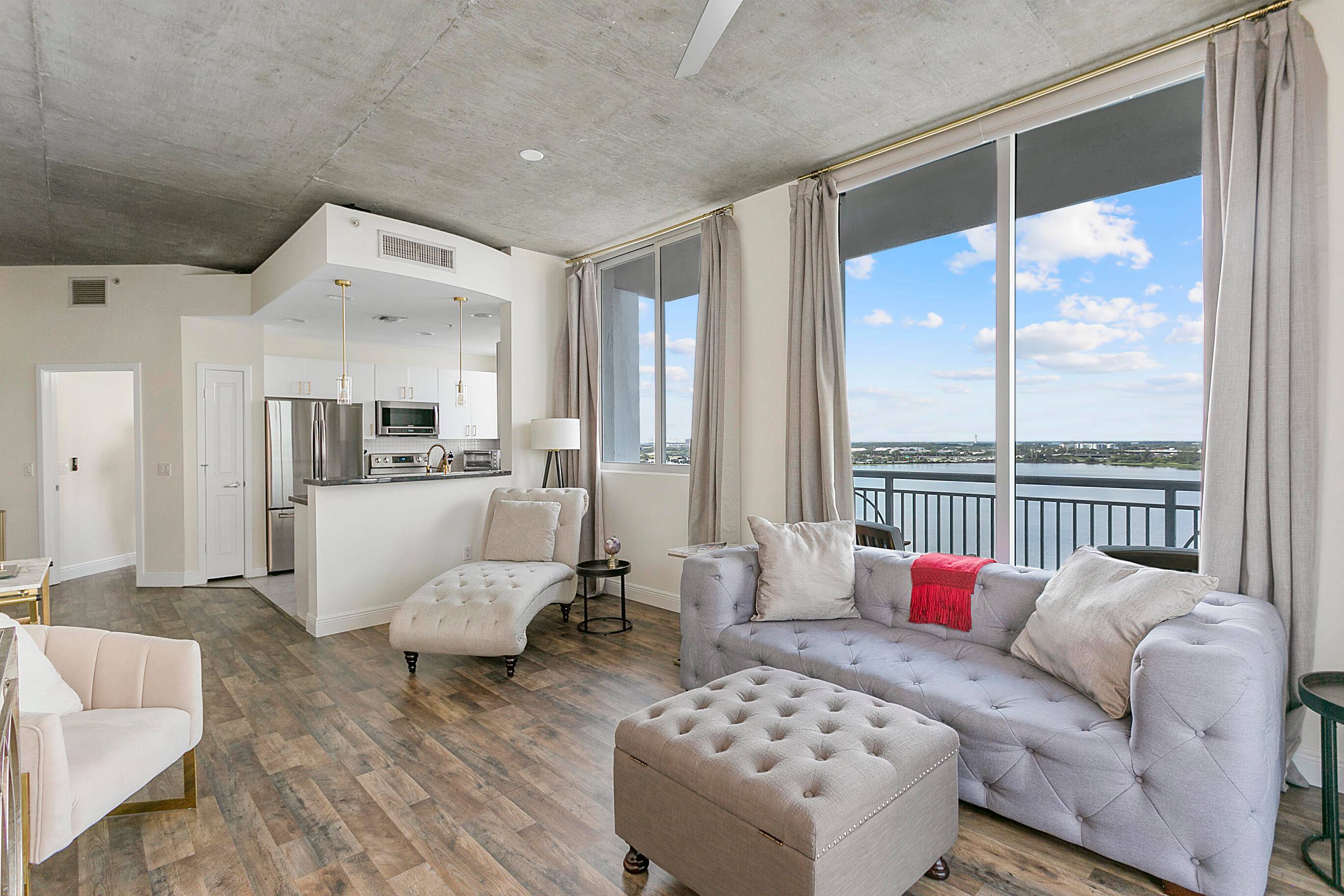 Amazing waterfront industrial loft style living at the Edge Condo in the heart of Downtown West Palm Beach.