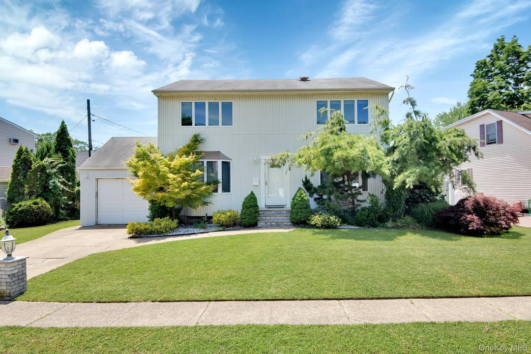 Welcome to this beautiful, sun filled 4 bedroom, 2.