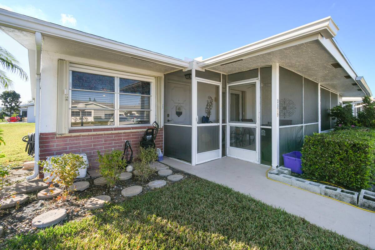 Don't miss out on this remarkable corner villa in the sought after Cypress Lakes community.