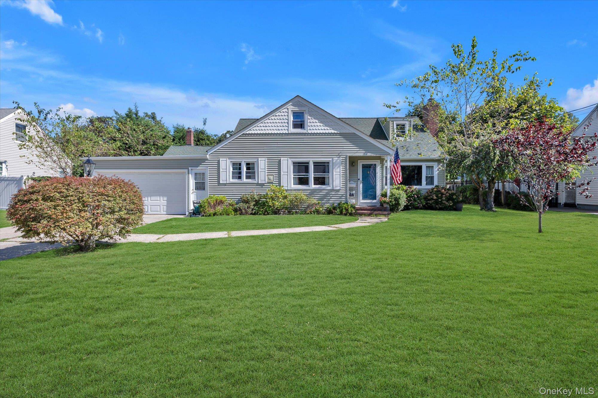 Charming Coastal Chic in South Amityville Welcome to this beautifully maintained and spacious home nestled in the heart of South Amityville.