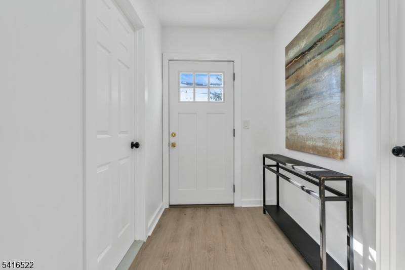 Newly renovated colonial featuring 4 bedrooms, 2 full bathrooms, and 1 half bathroom.