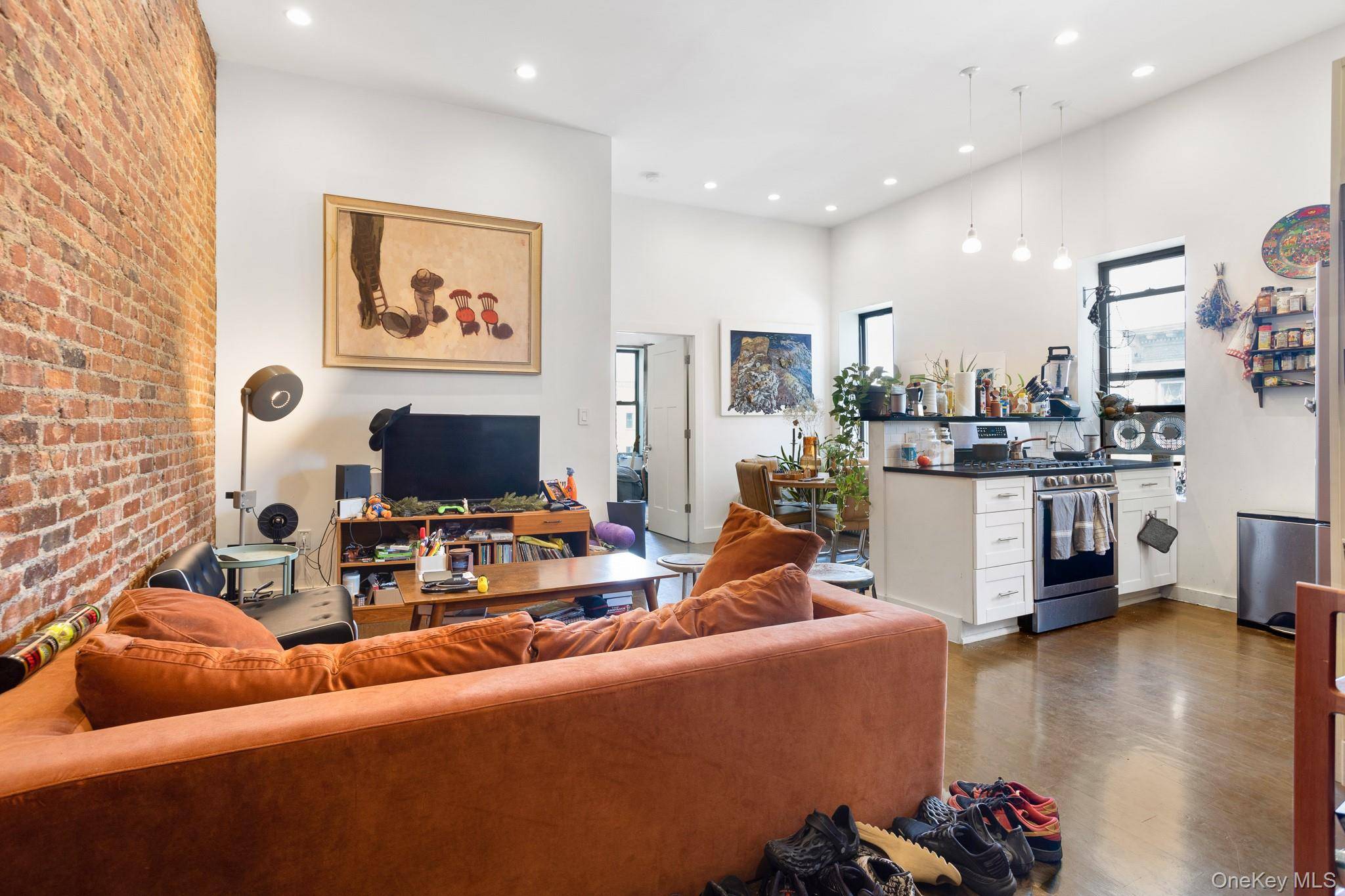 Sun splashed, character filled 3BR on the Bushwick Ridgewood border with high ceilings, an exposed brick living room, a windowed chef s kitchen, and a smart layout that fits real ...
