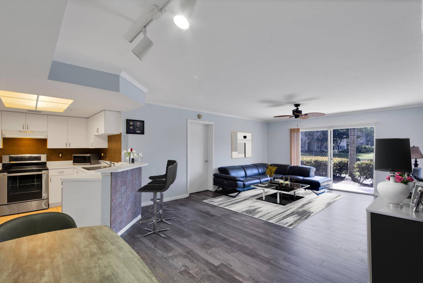 Discover this beautifully updated 2 bedroom, 2 bath first floor condo with an attached garage in a serene lakeside setting.