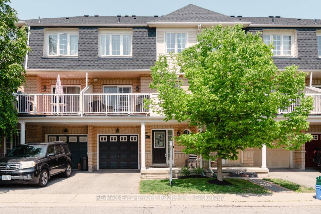 Beautifully upgraded freehold townhome offering exceptional value just steps to top rated Milton schools.