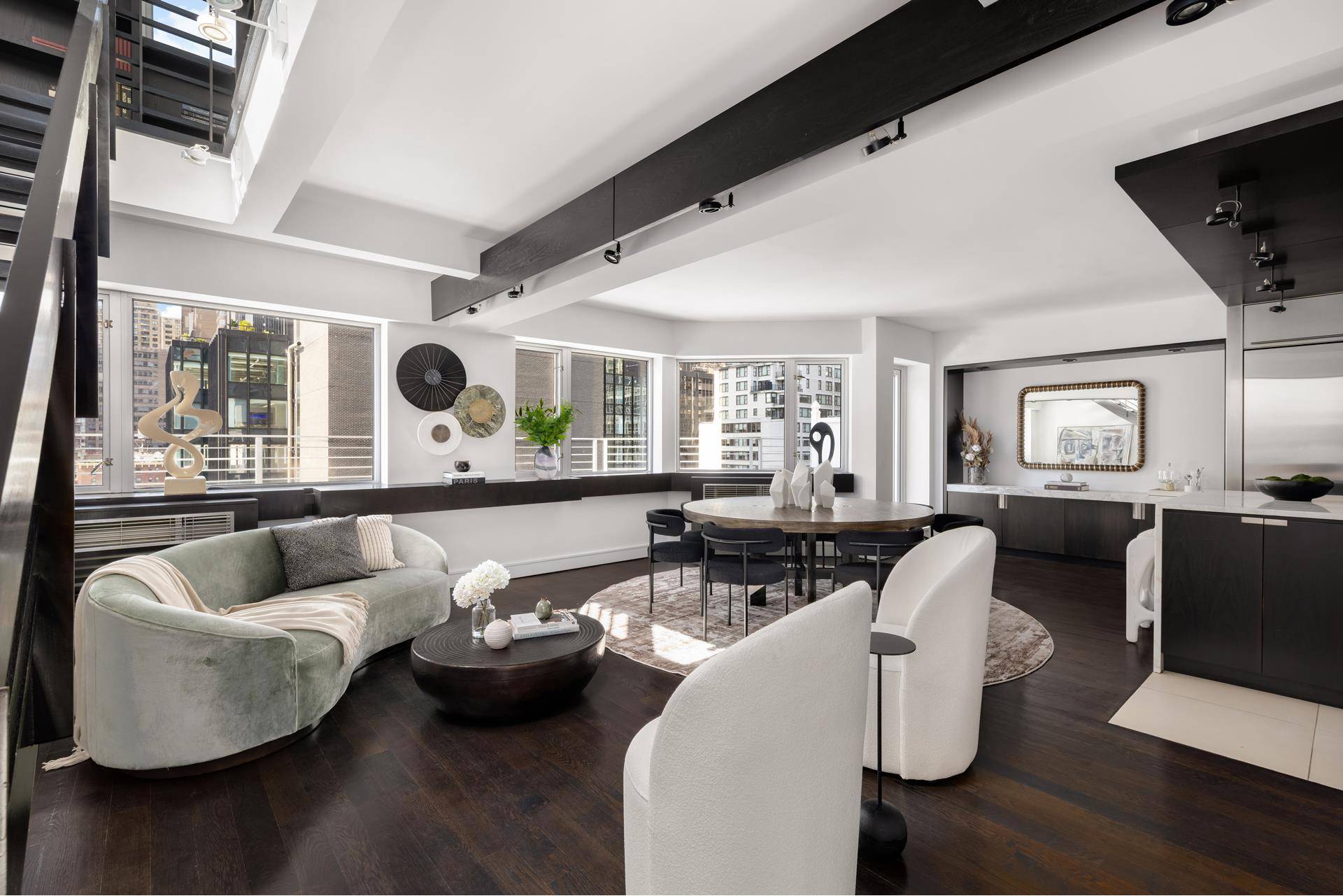 Bathed in sunlight and spanning two spacious levels, this inviting duplex penthouse CONDOMINIUM offers 3, 175 square feet of thoughtfully designed interiors and an impressive 1, 641 square feet of ...