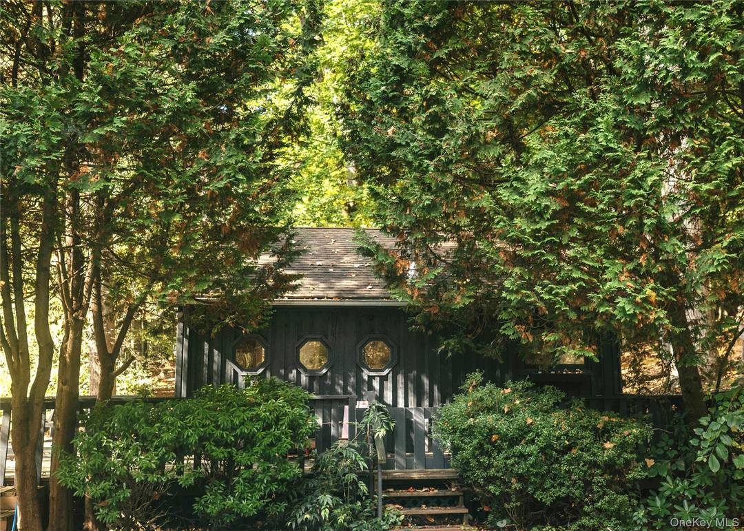 Tucked away on 15. 25 wooded acres, this rustic Kerhonkson retreat perfectly balances country charm with resort style living.