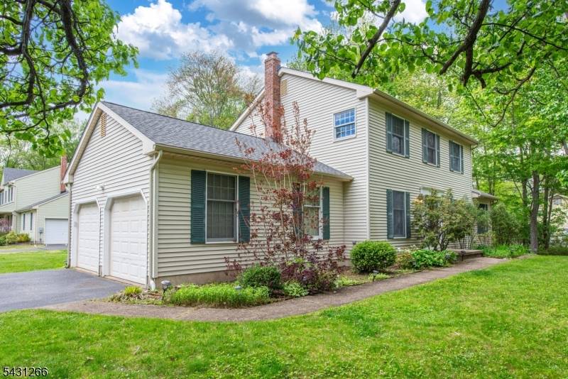 Beautiful colonial with updated kitchen featuring granite counters, large panty and new 2025 GE 30 electric range with convection, air fry, built in Wi Fi, and warming zone.