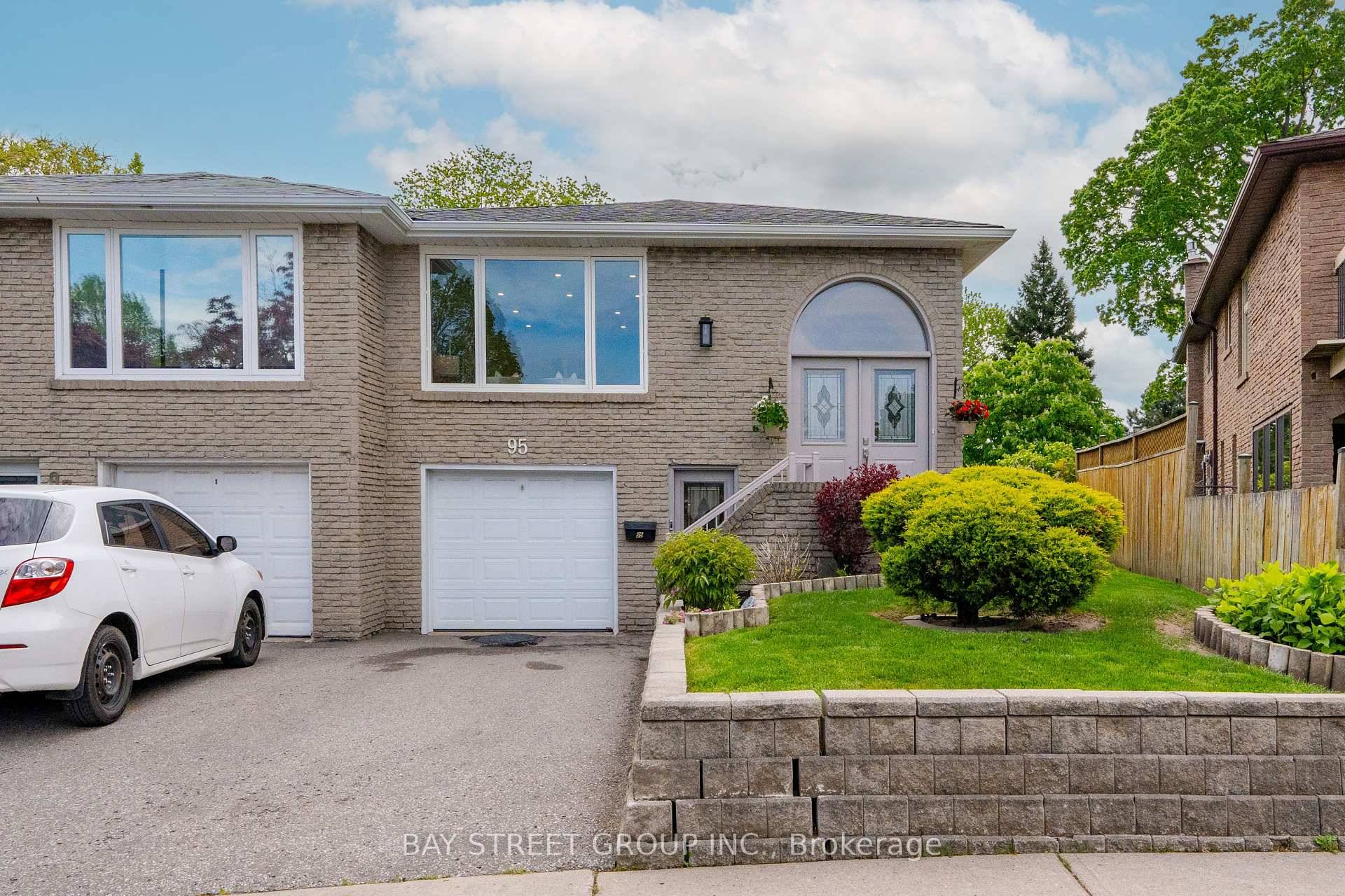 Fully Renovated Semi Detached with Walk Out Basement on a Rare Pie Shaped Lot !