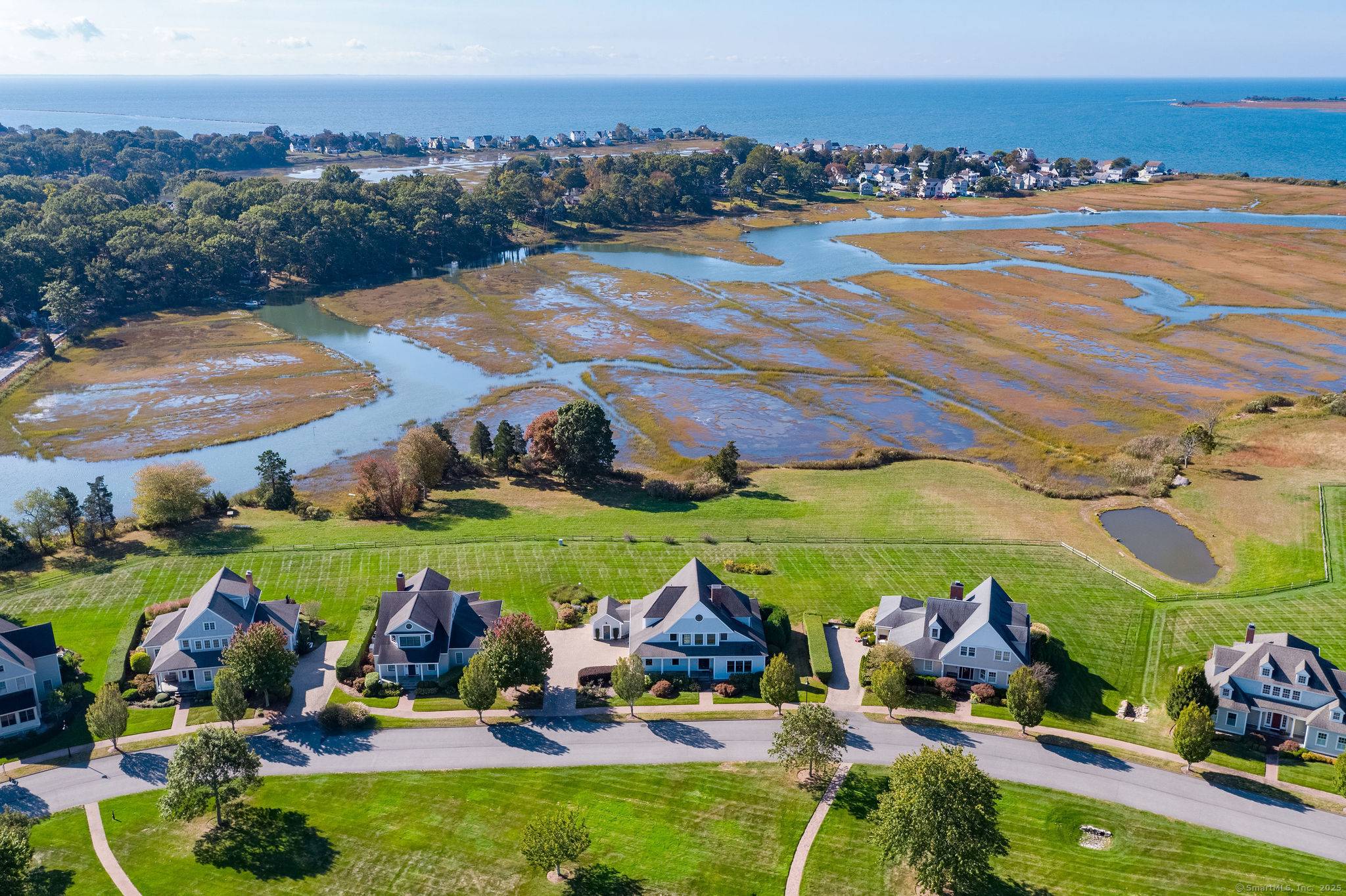 Luxury coastal living w stunning water views gorgeous sunsets located in The Hammocks, walk to the beach wake up everyday to spectacular panoramic views of the L.