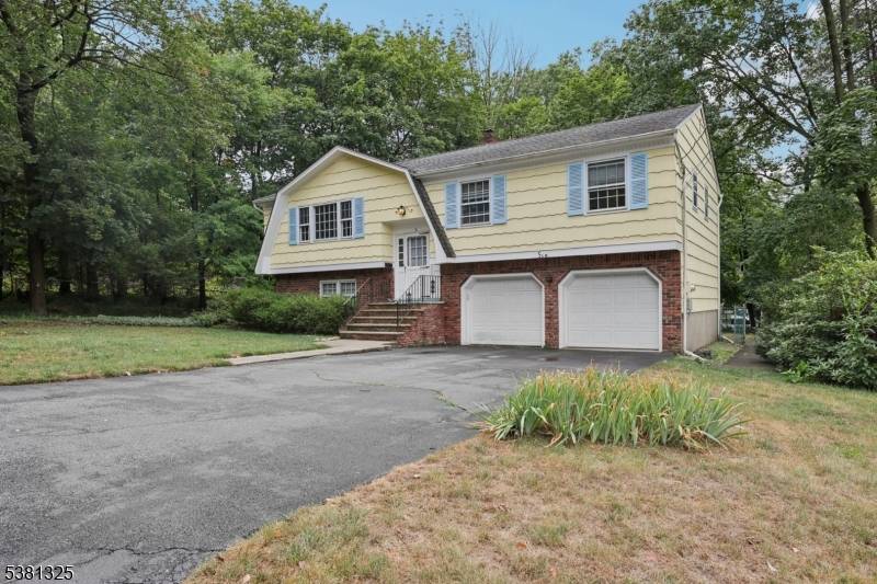 Welcome to this inviting Bi Level home on a peaceful, tree lined street in the sought after Orchard Elementary School district.