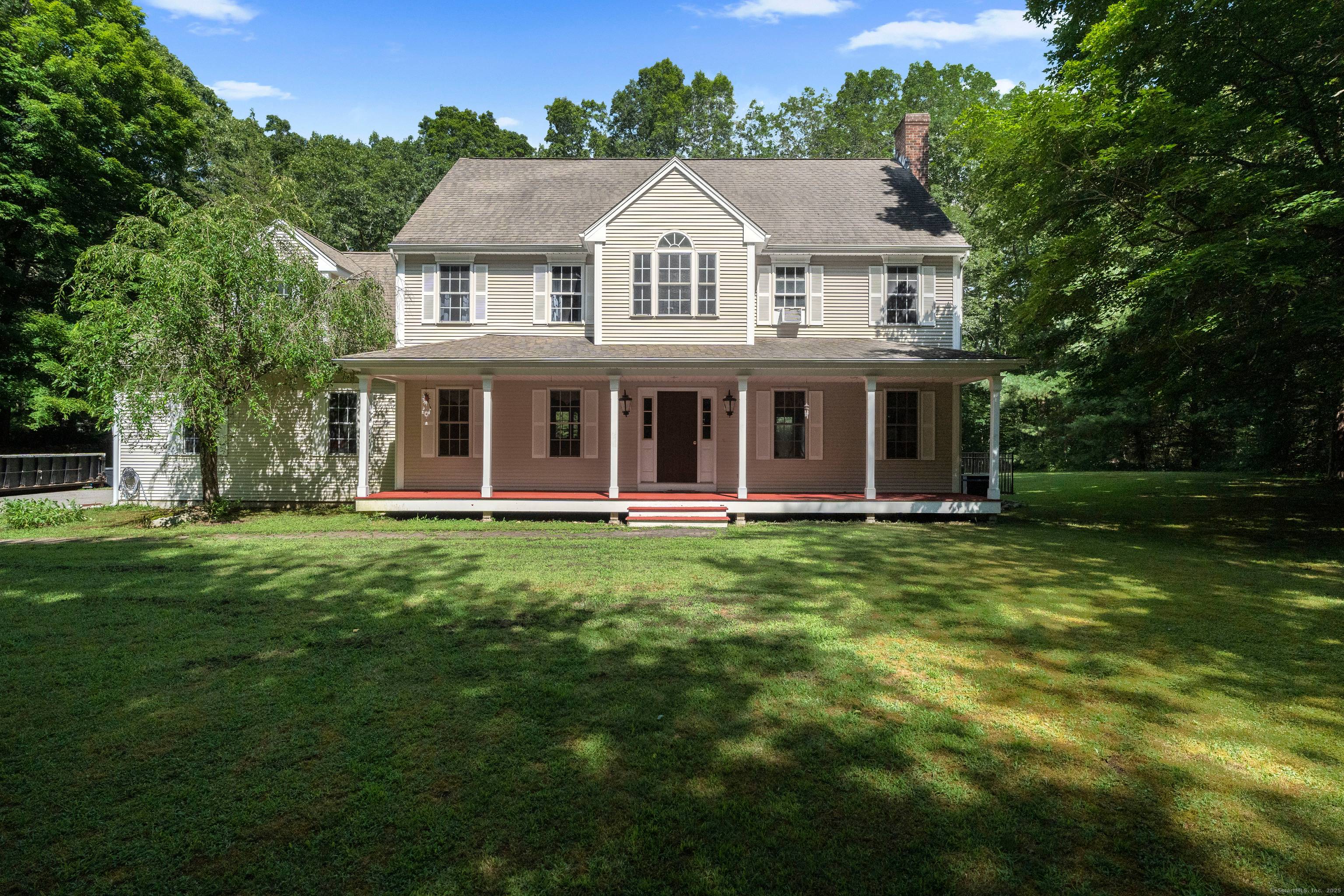 Nestled in the heart of a picturesque shoreline town, this beautiful Colonial home offers the perfect blend of timeless charm and modern comfort.