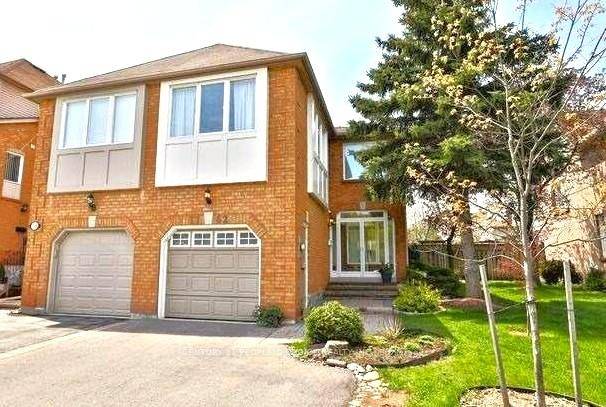 Wonderfully Maintained Executive Two Level Freehold End Unit Townhouse In The Highly Sought After Family Oriented Neighborhood Of Glen Abbey, Oakville.