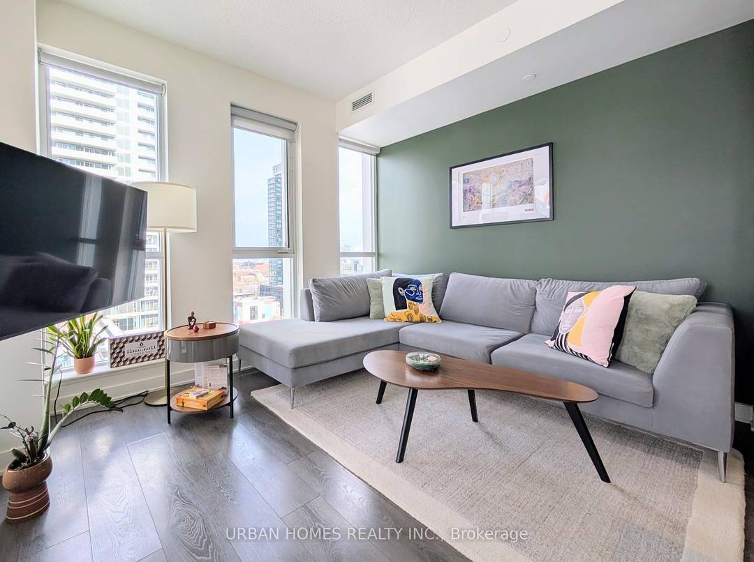This bright corner 1 bedroom plus oversized den currently styled as a dining room offers a highly functional open concept layout with lots of windows and abundant natural light.