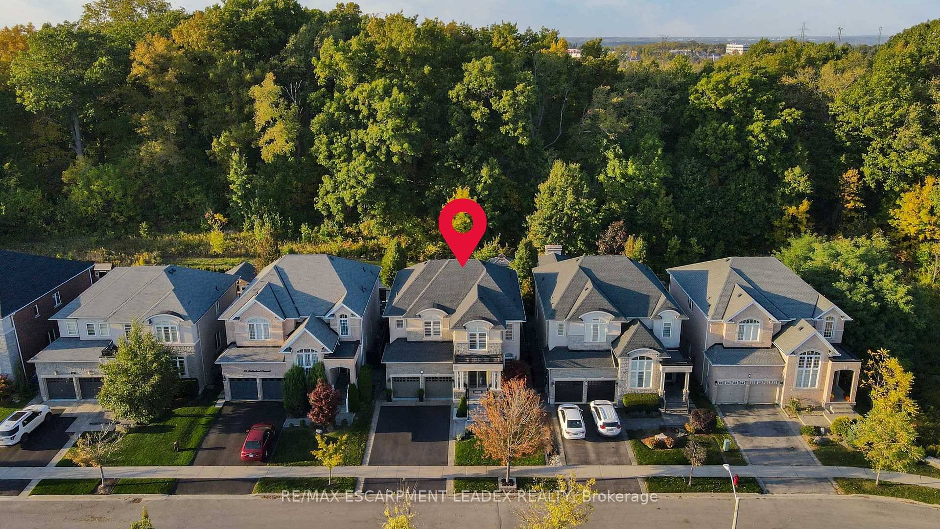 Welcome to this distinguished home in Ancasters sought after Meadowlands community, showcasing pride of ownership throughout.