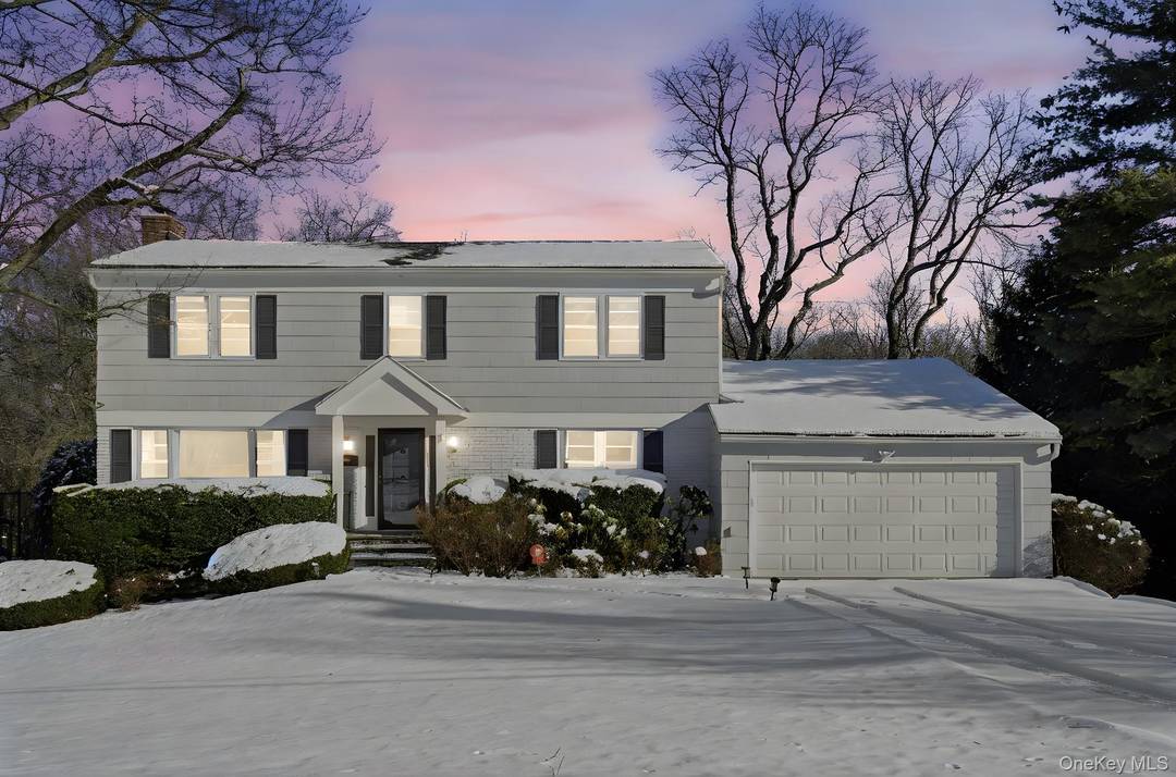 Experience the charm of this classic Center Hall Colonial, ideally situated in the highly sought after Quaker Ridge neighborhood on nearly half an acre of beautifully landscaped property.