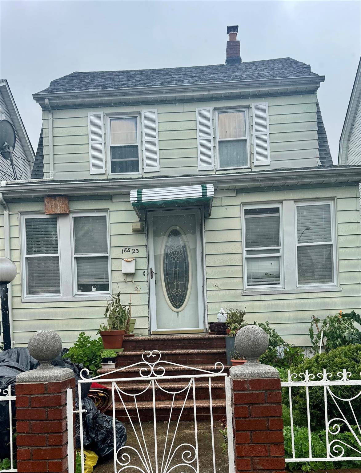 Spacious Colonial, spacious bedrooms, 3 Full Bathrooms, front enclosed porch.