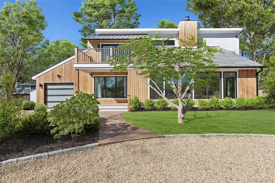 Welcome to this stunning, newly renovated contemporary home in the desirable Redwood section of Sag Harbor Village.