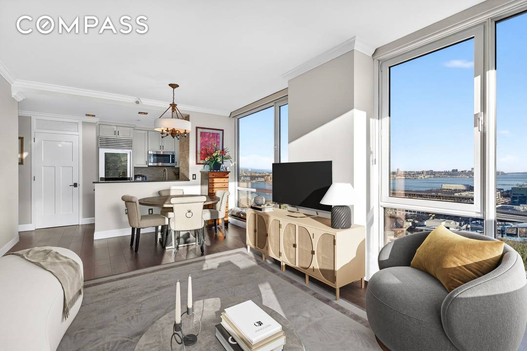 Welcome to Residence 23E a beautifully renovated two bedroom, two bathroom corner home offering approximately 1, 100 square feet of refined living space and breathtaking panoramic views of the Hudson ...