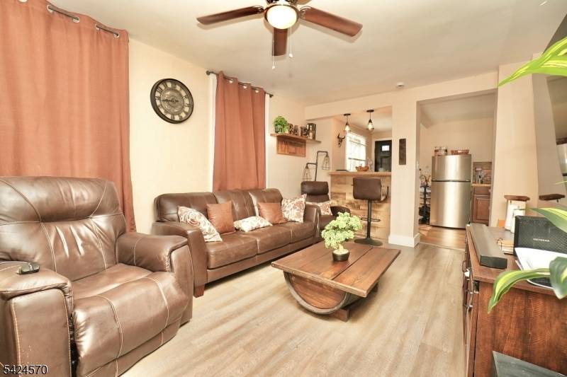 The home includes a spacious backyard with a brand new fenced in section, perfect for outdoor enjoyment, entertaining, or relaxation.