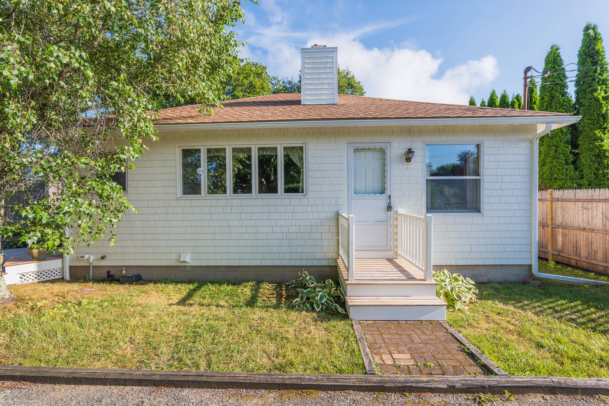 This charming Cottage in Narragansett, RI offers comfortable living with two bedrooms and beautiful hardwood floors throughout.