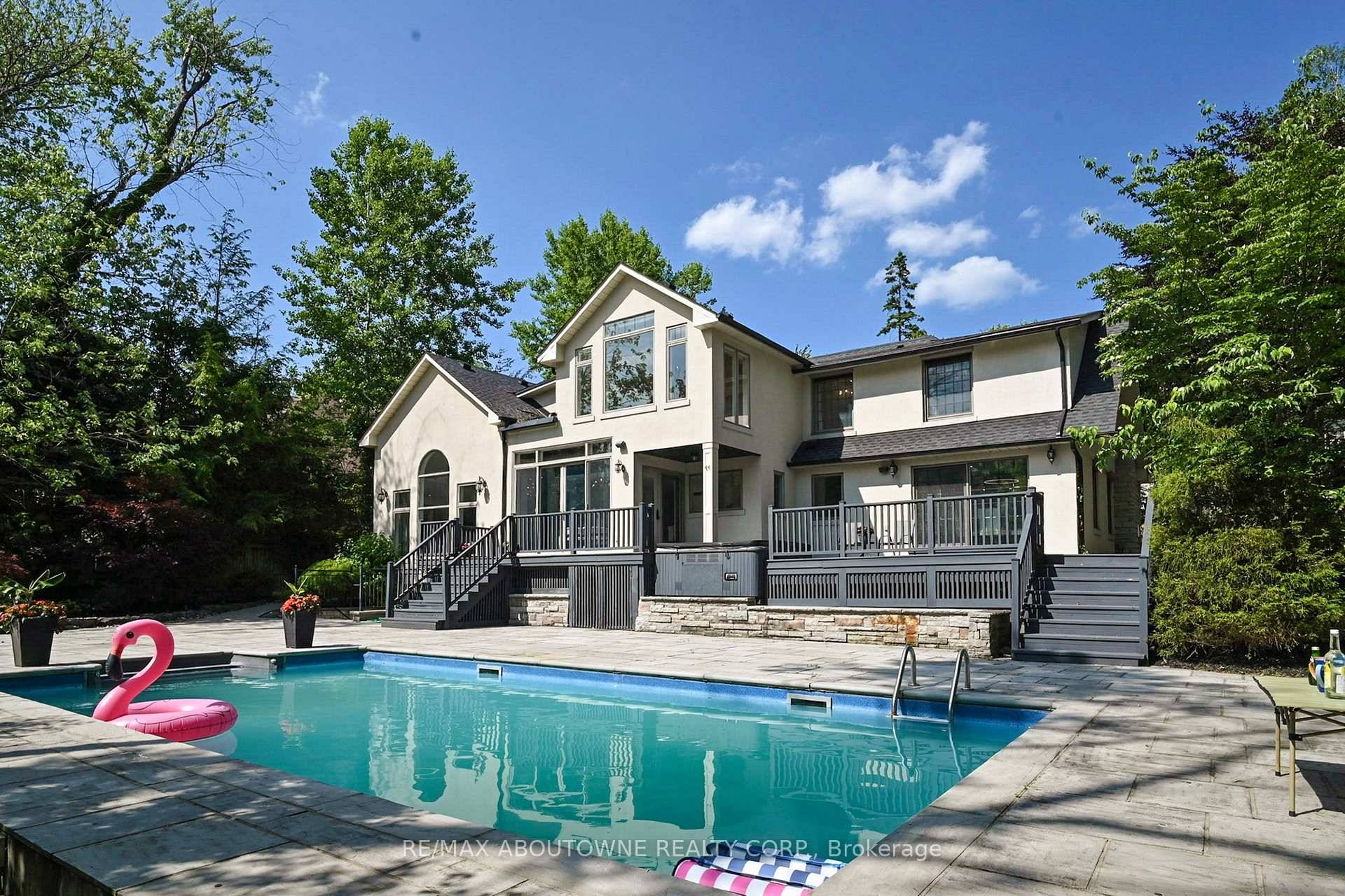 Stunning custom built residence on coveted Elton Park Road in prestigious Morrison, offering timeless elegance, privacy, and modern comfort.