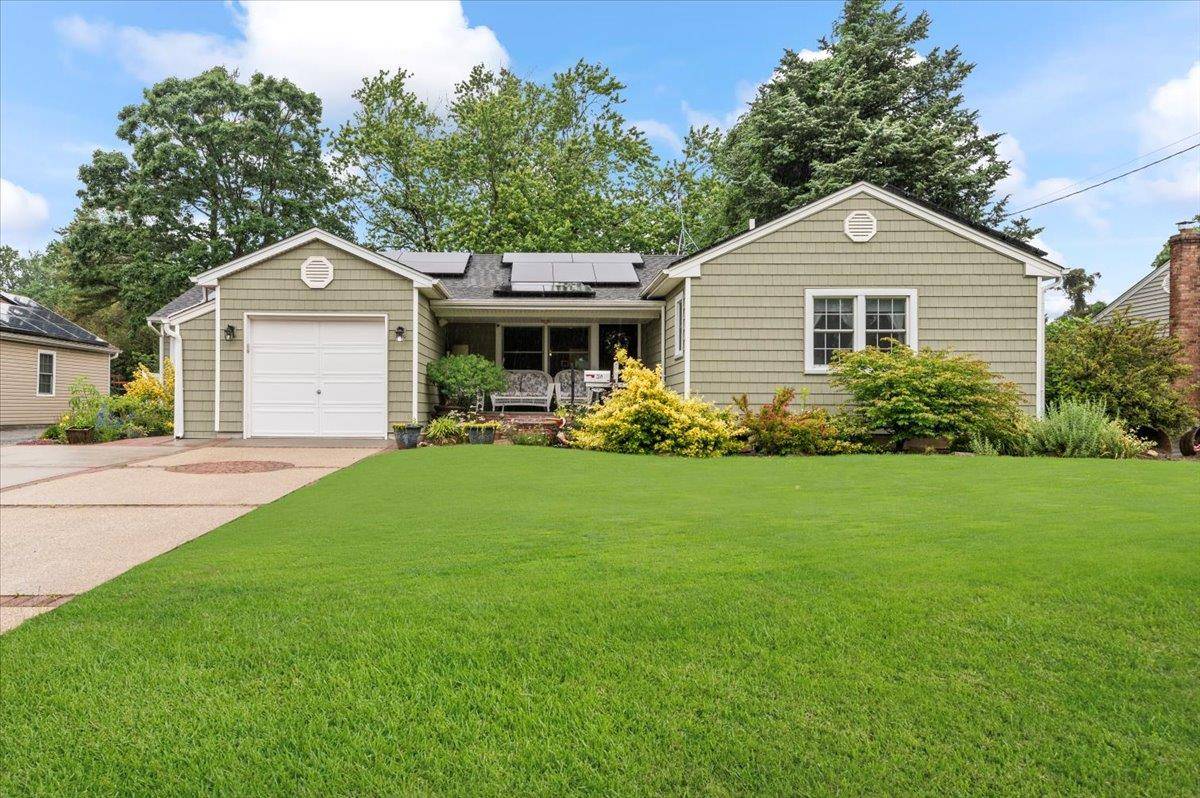 Welcome to 50 Towne Street a truly one of a kind gem available to view in Amityville Village !