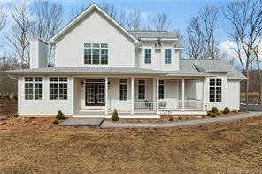Enjoy the best of new construction living in this custom, modern farmhouse.