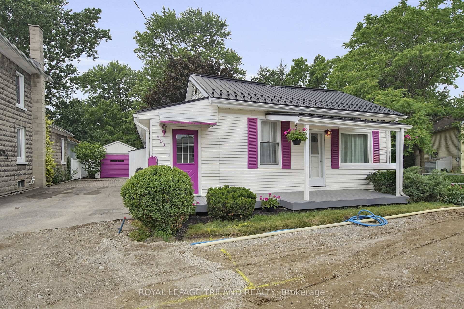 Charming century home with lovely cottage like feel !