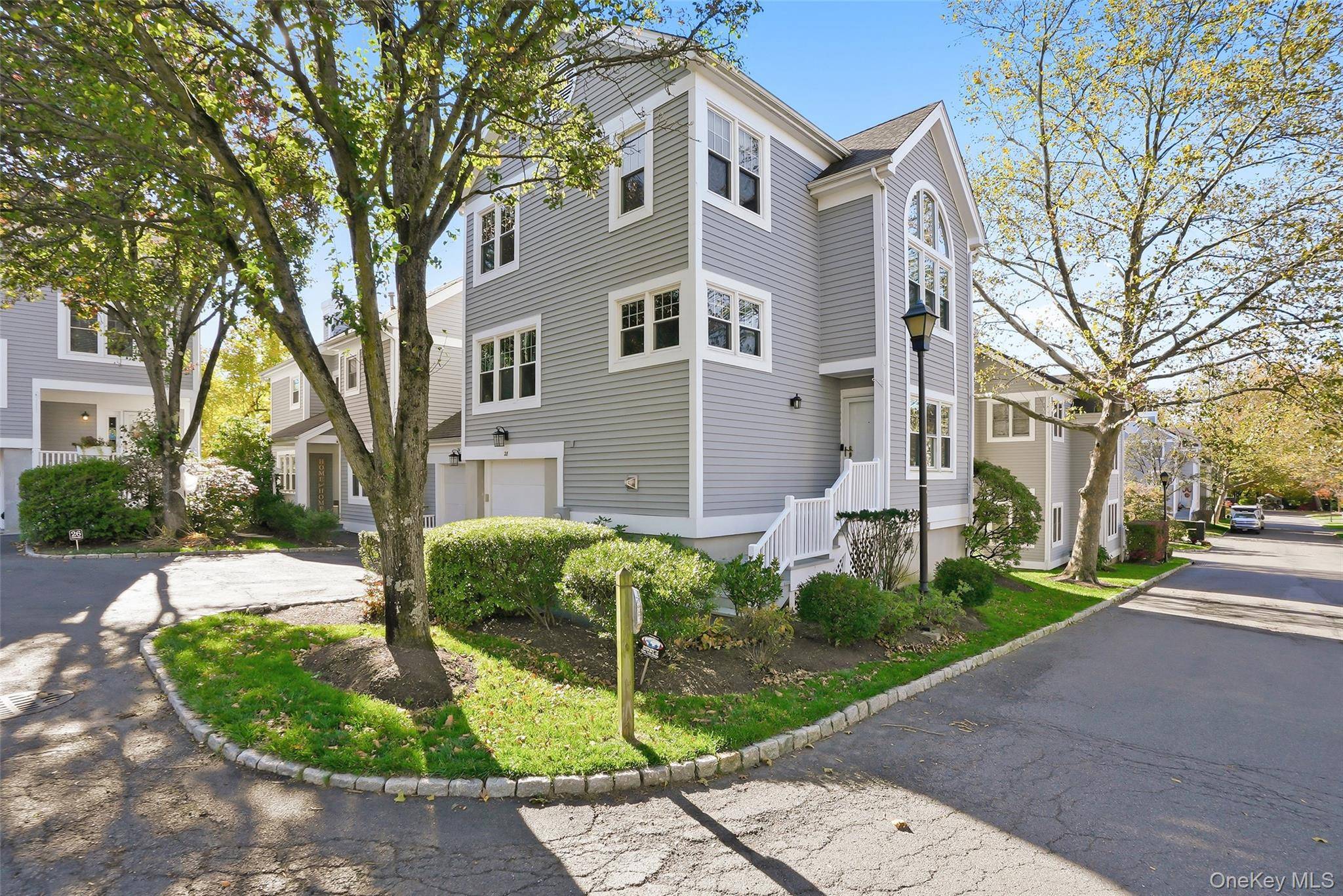 Welcome to 28 Brookridge Court Rye Brook, NY an exceptional light filled townhouse offering modern comfort and timeless style.