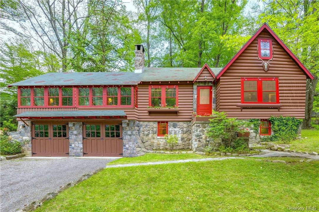 Welcome to your enchanting lakeside haven in the Valhalla Highlands community, a retreat unlike any other.