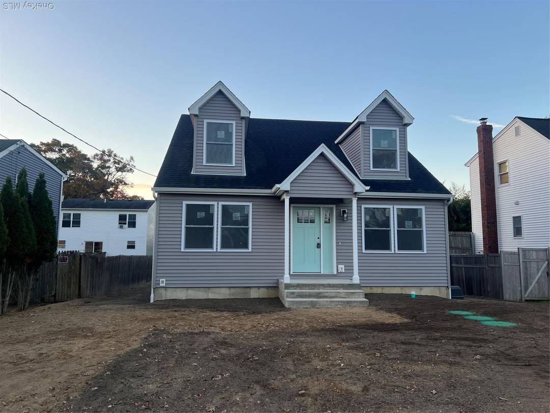 Brand new custom Cape Cod home offering East End living with a modern touch.