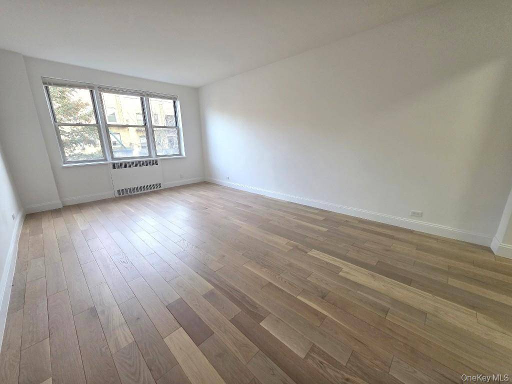 A beautiful modern Large One bedroom Coop sponsor unit located in Jackson Heights Landmark district, fully renovated, just a short walk to shopping, restaurants, public transportation and much more.
