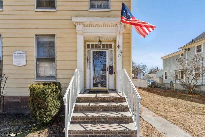 Welcome to this beautifully preserved historic Colonial home built in 1854, offering timeless character and exceptional potential.