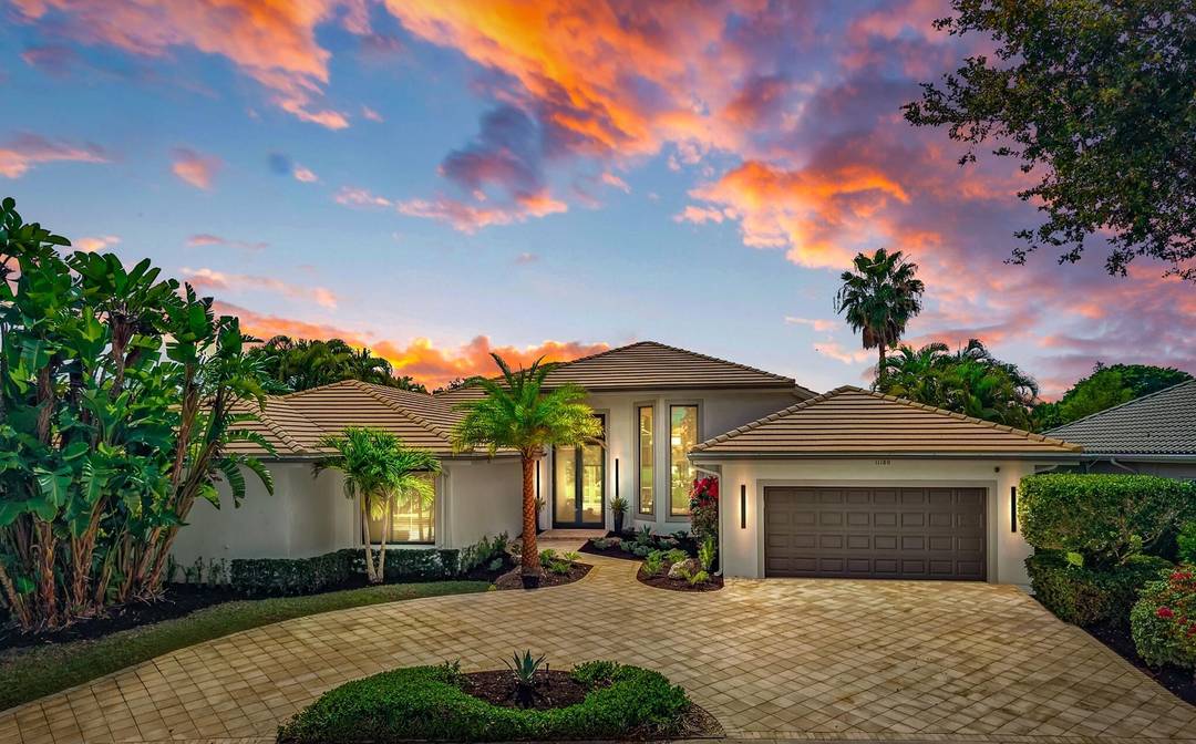 Exquisitely renovated 4BR 4BA lakefront estate in the desirable Isle Brook community of renowned Palm Beach Polo, showcasing a refined open concept design and elevated luxury finishes throughout.