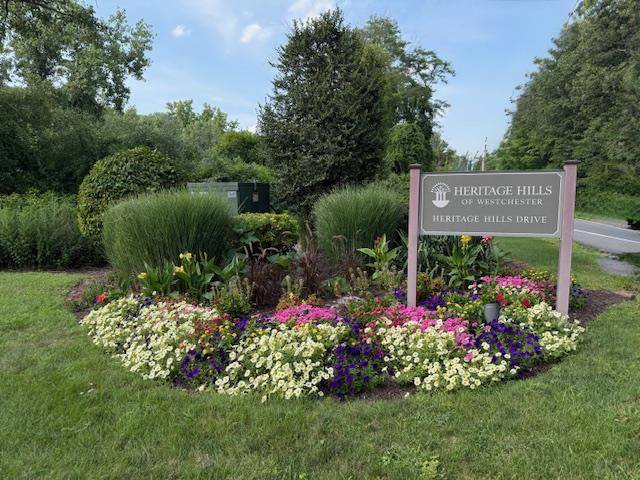 Lovely Madison one level end unit in the desirable Heritage Hills community !