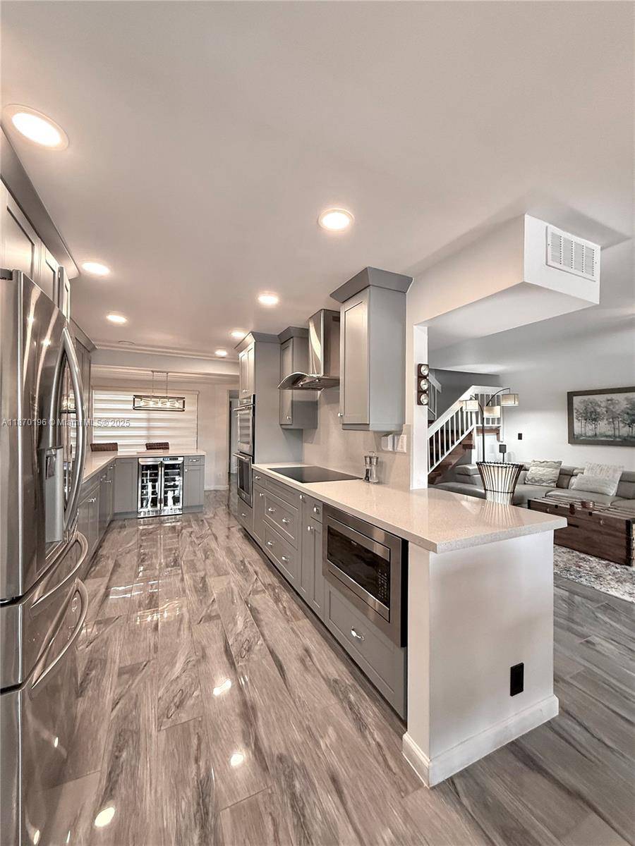 Step inside this beautifully updated townhouse where style meets effortless comfort.
