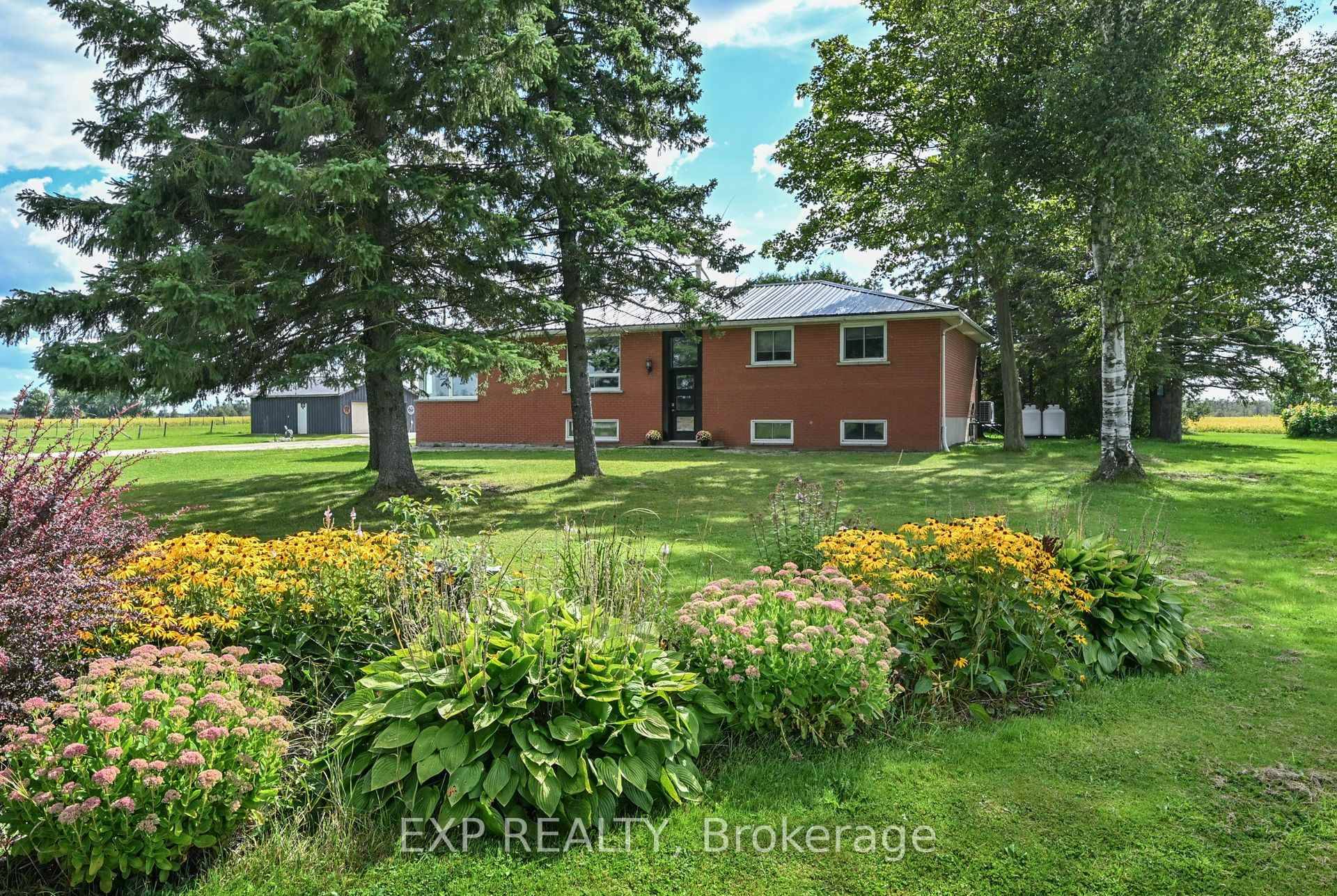 Discover the perfect blend of country charm and modern comfort in this spacious all brick bungalow, set on 3 acres in sought after Melancthon.