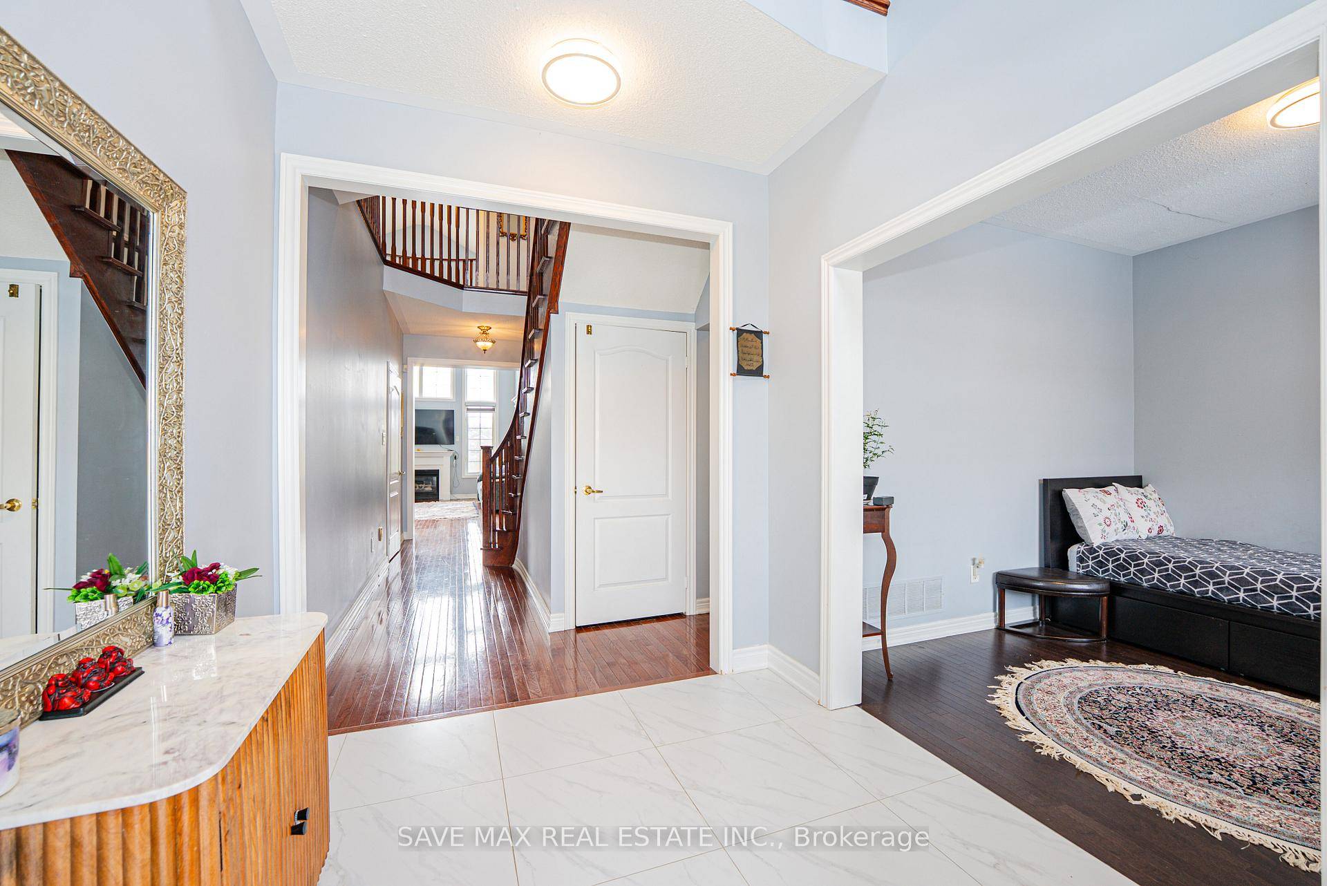 Backing onto a serene lake, this gem offers breathtaking views from a spacious deck.