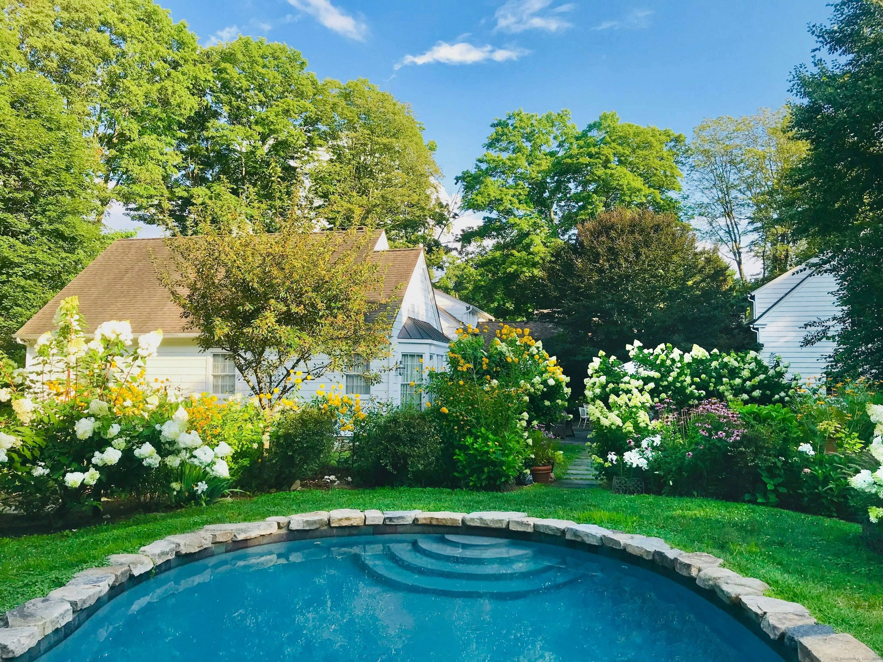 Embrace Summer in Style This meticulously curated home blends European elegance with timeless historic charm.
