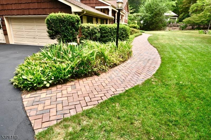 Nestled in the Highlands of NJ, this majestic, custom home rests prominently in Kensington Wood, one of Ringwood's most preferred neighborhoods.