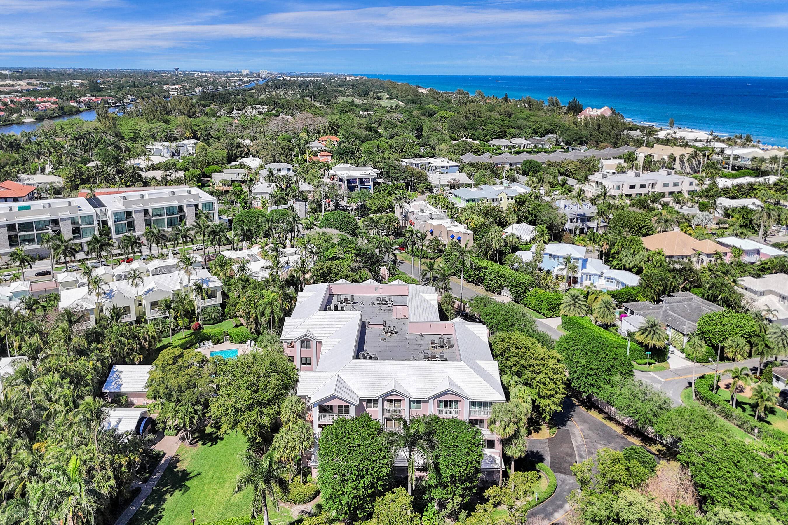 Nestled just one block from the beach and 8 blocks to trendy Atlantic Avenue and downtown Delray Beach in a private gated enclave, surrounded by a lush tropical setting with ...