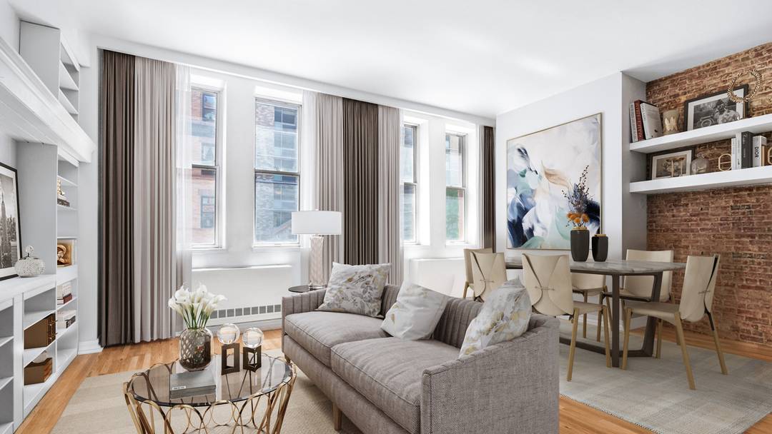 Experience authentic loft living in this rarely available, sun drenched south facing convertible one bedroom loft residence featuring soaring 13'4 foot ceilings, exposed brick walls, oversized industrial style windows, and ...