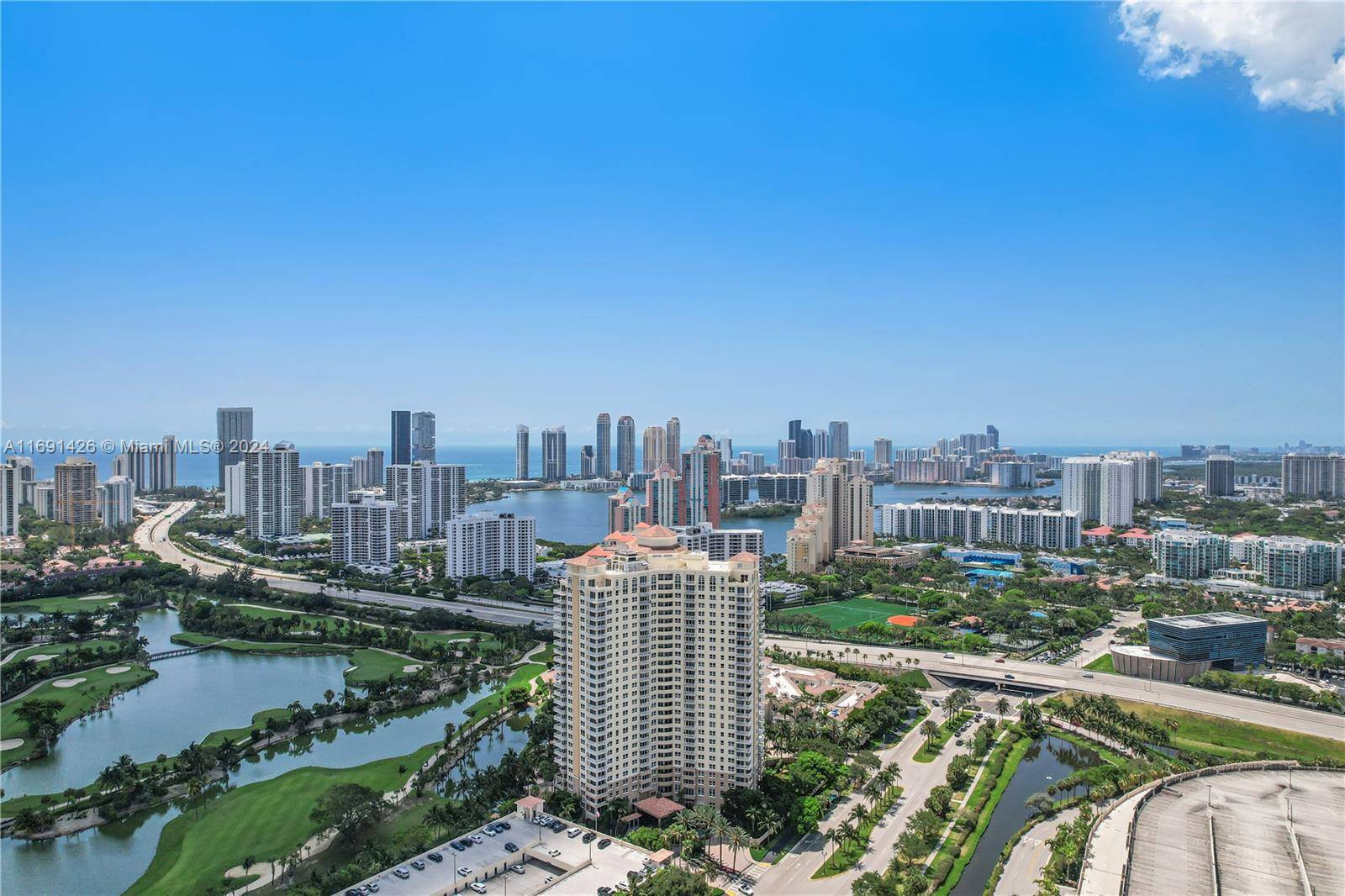 BEAUTIFUL UPGRATED 2 BED 2 BATH CORNER UNIT, WRAP AROUND TERRACE OFFERING PANORAMIC VIEWS, LOCATED IN THE HEART OF AVENTURA.