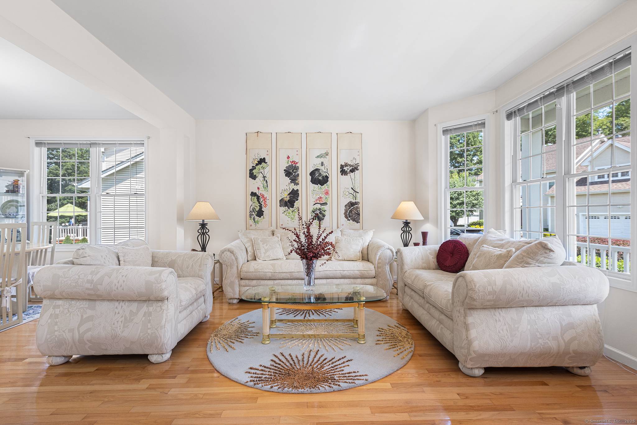 Immaculate freestanding home in the sought after Traditions of Southbury features a bright, open floor plan, spectacular views, and beautiful landscaping with a sunny front porch and spacious deck.