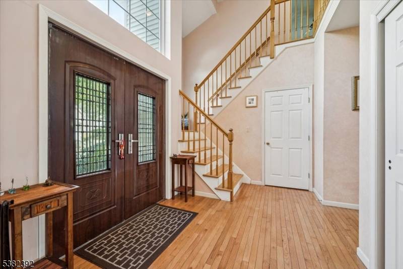 Welcome home to this classic 4 bedroom Colonial with a finished walkout basement situated on a private cul de sac in desirable Green Brook Township.