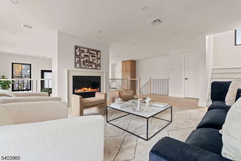 Unit A is a distinguished 3, 850 SF new construction residence offering a thoughtfully designed open concept layout that seamlessly connects the kitchen, dining, and living areas.